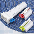 Qualityzone Plastic Squeezer Toothpaste Dispenser, For Bathroom Aceessories